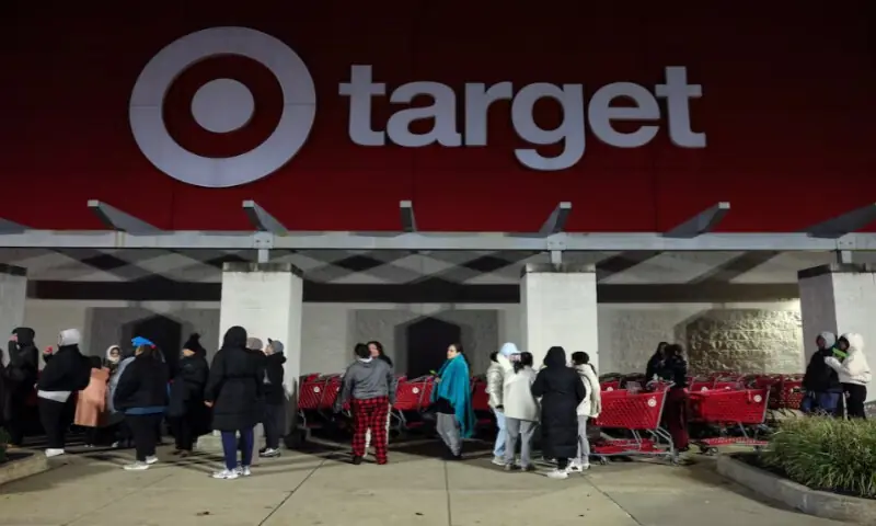 Shoppers wait outside for Black Friday deals, a post-Thanksgiving shopping frenzy that attracts throngs of bargain hunters to stores, outside a Target store in Westbury, New York, on November 28, 2025. Reuters