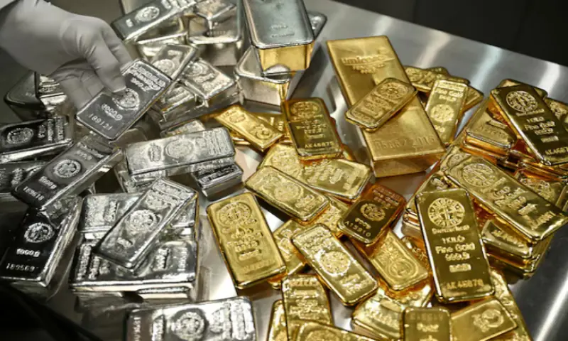 Precious metals retreat, silver dips after breaching $80/ounce