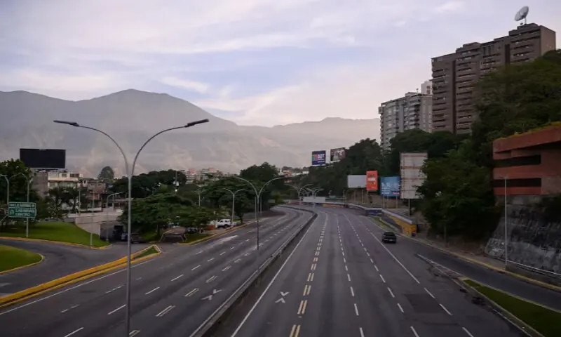 A vehicle drives along an empty highway, after U.S. President Donald Trump said the U.S. has struck Venezuela and captured its President Nicolas Maduro, in Caracas, Venezuela on January 3, 2026. Reuters