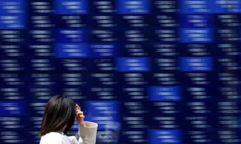 Stocks slide in Asia as metals melt down, earnings loom