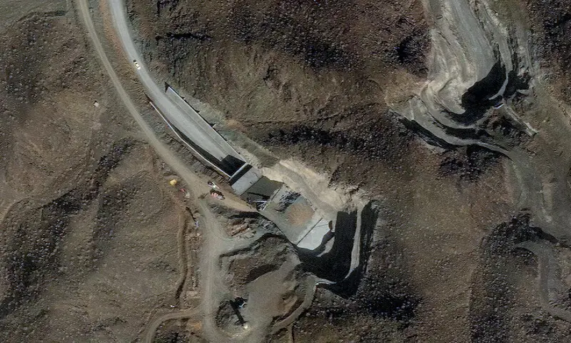 A satellite image shows ongoing efforts to harden and strengthen a facility&rsquo;s two tunnel entrances at a complex near Nantanz, Iran. &ndash; Reuterts