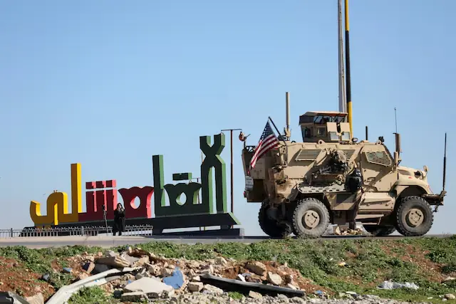 US military begins withdrawing from main base in northeast Syria, Syrian sources say
