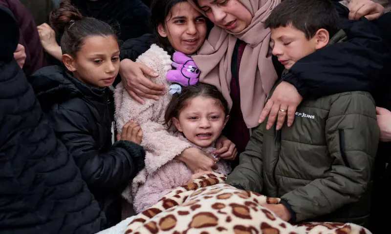 A child cries as mourners carry the bodies of a Palestinian family who were killed in an Israeli raid, during their funeral in Tammoun town near Tubas in the Israeli-occupied West Bank on Sunday. &ndash; Reuters