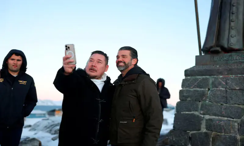J&oslash;rgen Boassen posed for a selfie with Donald Trump Jr. during a visit to Nuuk in early January 2025. They were accompanied by conservative activist Charlie Kirk (left), who was later killed in the US. Boassen now spends much of his time in the US. &ndash; Reuters