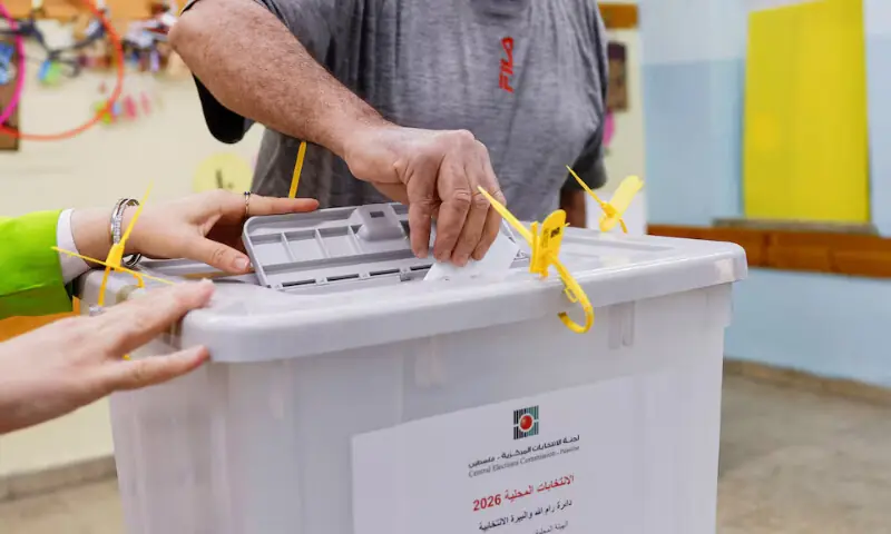 A Palestinian man votes during the municipal council election in Al Bireh, in the Israeli-occupied West Bank on Saturday. &ndash; Reuters