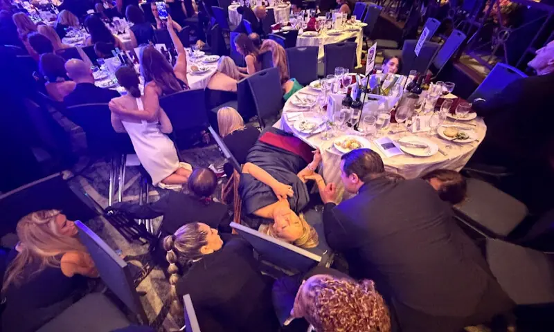 Guests take cover at the White House Correspondents&rsquo; dinner. &ndash; Reuters
