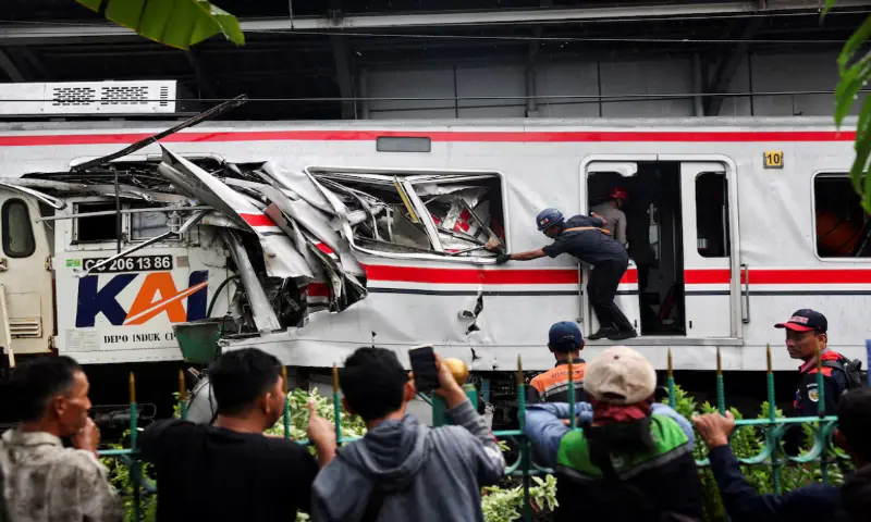 Train crash near Jakarta kills 14, dozens trapped as rescue continues