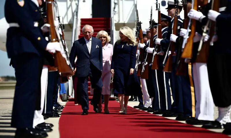 Britain&rsquo;s King Charles and Queen Camilla walk with US Protocol Chief Monica Crowley as they arrive at Joint Base Andrews, Maryland. &ndash; Reuters
