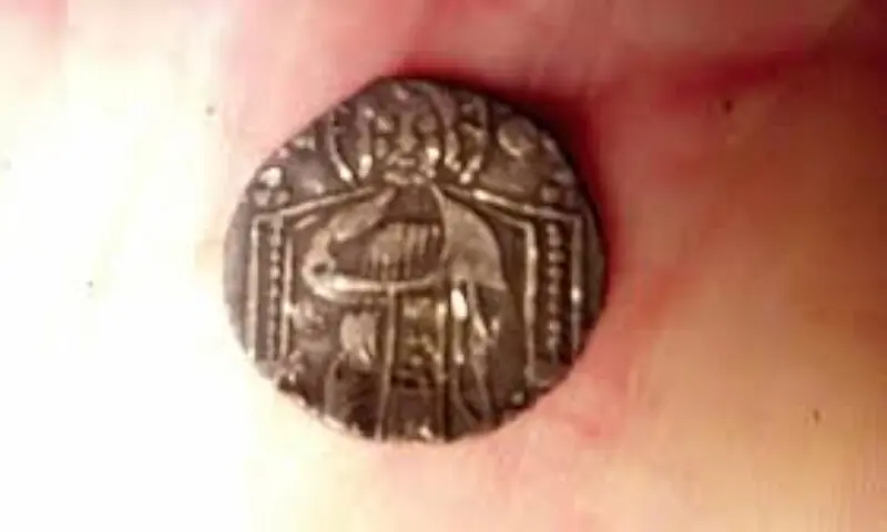 Teen discovers 2,300-year-old Greek coin in Berlin field