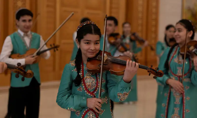 School children perform at a trade fair in Ashgabat, Turkmenistan. &ndash; Reuters