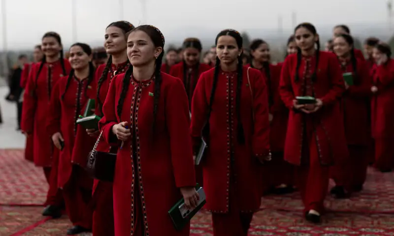 Students attend an opening ceremony of a trade fair in Ashgabat, Turkmenistan. &ndash; Reuters