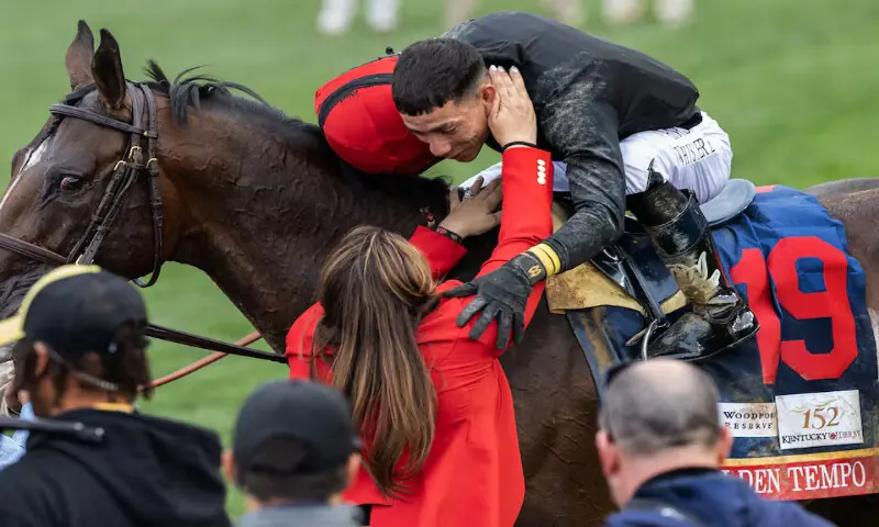 Cherie DeVaux, trainer of Kentucky Derby winner Golden Tempo, reaches to greet jockey Jose Ortiz in the winner&rsquo;s circle during the 152nd running of the Kentucky Derby at Churchill Downs. &ndash; Reuters