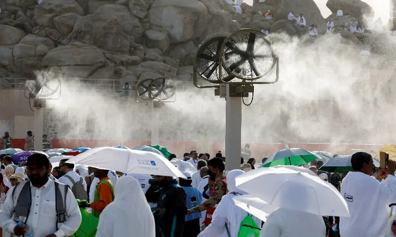 Muslim pilgrims gather at mount of Mercy on Arafat plain during annual Hajj