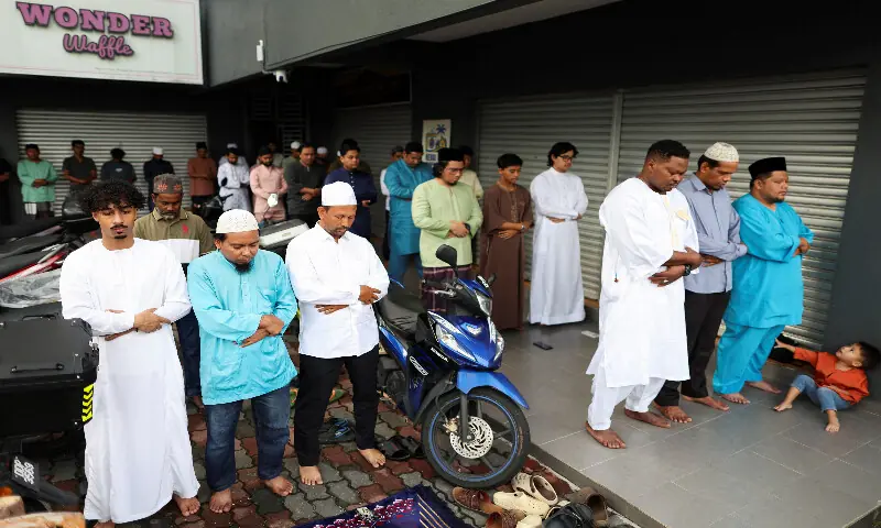 Muslims celebrate Eid al-Adha with prayers and animal sacrifice