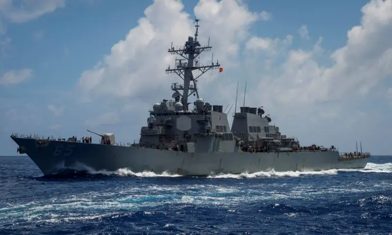 Iran says it fired warning missiles and drones at US warships in Gulf of Oman