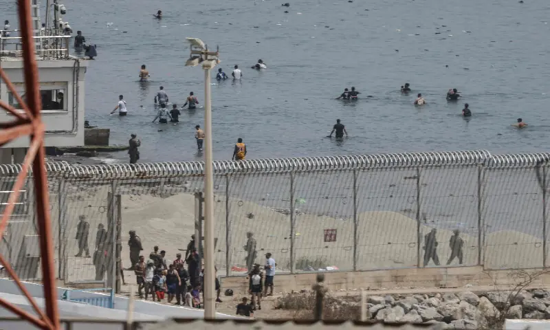 EU races to contain new migrant crisis as thousands cross into Spain's N. Africa enclave