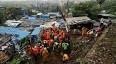Heavy rains kill 18 in India, dozens feared trapped in landslides