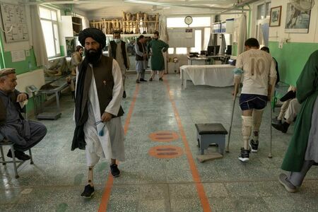 In Kabul clinic, Taliban and the soldiers they fought confront wounds of war