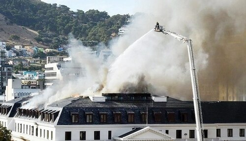 Wind restarts fire engulfing South Africa's parliament