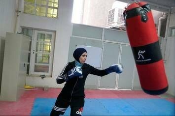 Iraqi women boxers aim sucker punch at gender taboos