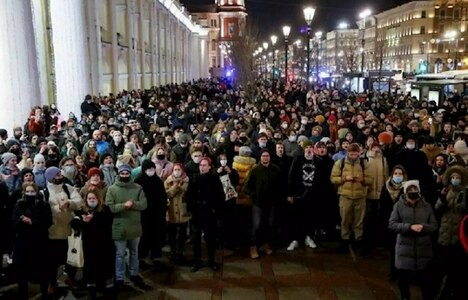 Russia cracks down on home front as its troops invade Ukraine