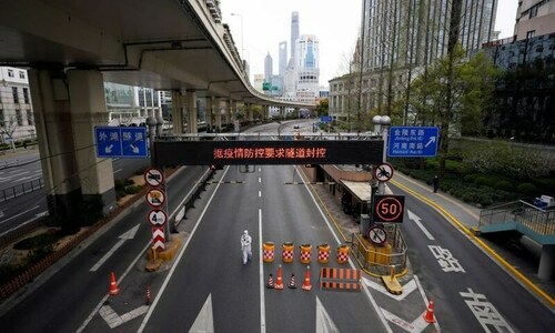 Half of Shanghai in lockdown to curb Covid-19 outbreak
