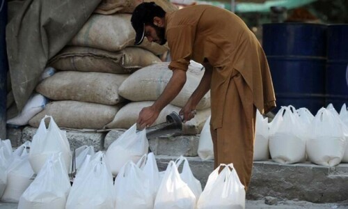Pakistan feels pain as subsidies ripped off petrol, flour inches up