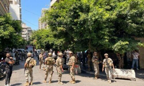 Armed man demanding frozen deposits takes hostages at Lebanese bank