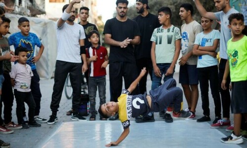 Gaza children breakdance to kick stress away