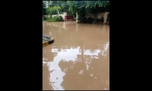 Rainwater floods houses in Lahore leaving residents trapped