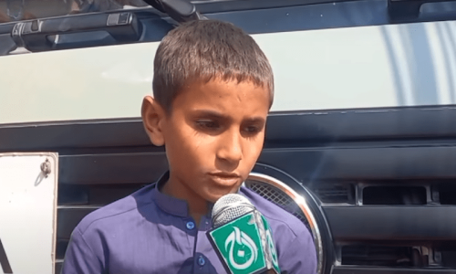 Afghan school boy leaves for country as his migrant father is left behind