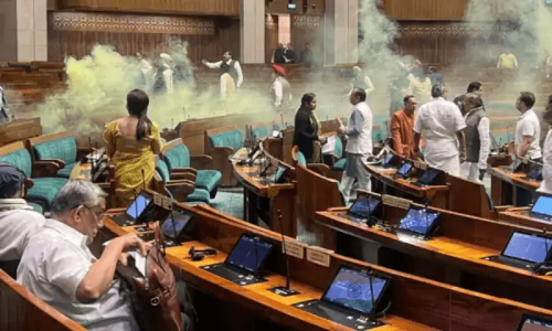 Man jumps into Indian parliament, sets off smoke can in major security breach