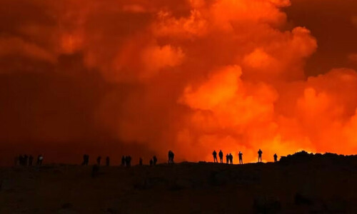 Iceland volcano erupts near town after weeks of quake activity