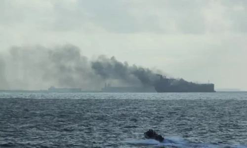 Oil tankers on fire after colliding off Singapore, crew members rescued