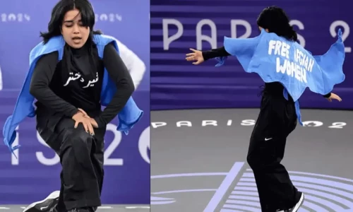 Afghan refugee athlete disqualified for slogan on cape