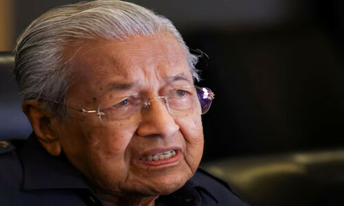Malaysia ex-PM Mahathir, 100, discharged from hospital
