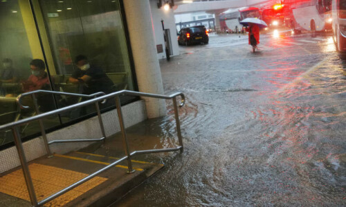 Hong Kong issues highest weather warning as rains shut schools, courts and hospitals