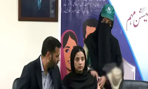 Health Minister Mustafa Kamal vaccinates daughter against HPV