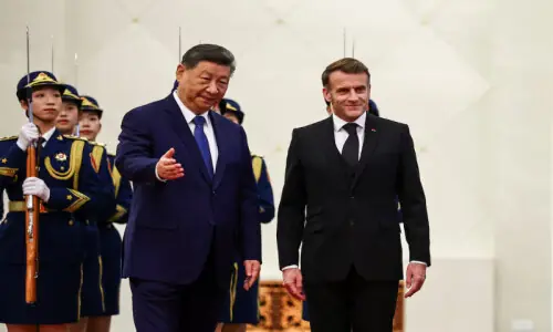 Macron urges Xi to help correct ‘unsustainable’ global trade imbalances