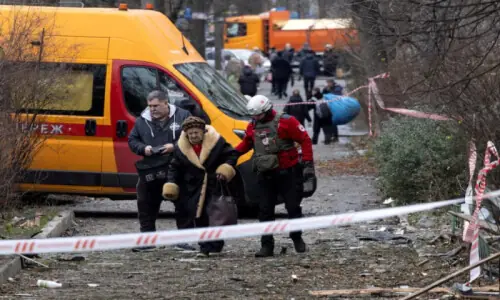 Russian air attack on Ukraine kills three and sparks sweeping outages