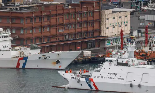 Taiwan on high alert as Chinese ships pull back after massive drills