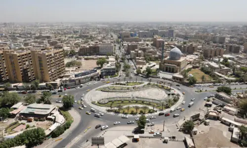 US threatens sanctions on Iraq if Iran-backed groups join govt