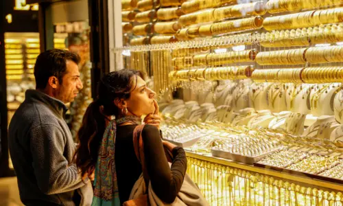 Gold, silver rise to near record highs on safe-haven demand