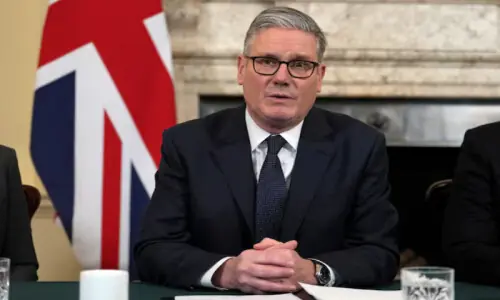 Britain vows to defend interests as US-Israel strike hits Iran