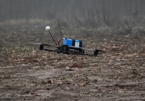Ukrainian drone strike hits apartments, kills two adults and child, officials say