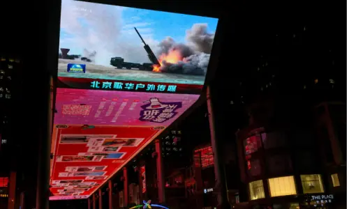 Taiwan sees only warships and warplanes as China talks peace with opposition