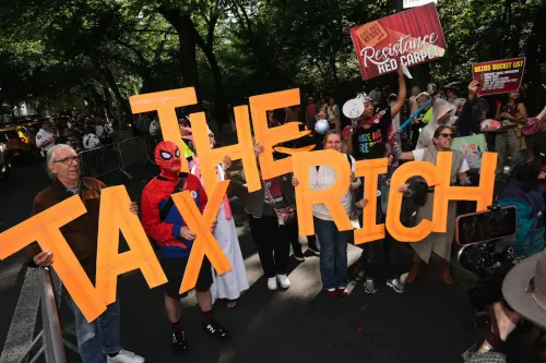 Stars embrace costume at Met Gala as protesters target Bezos