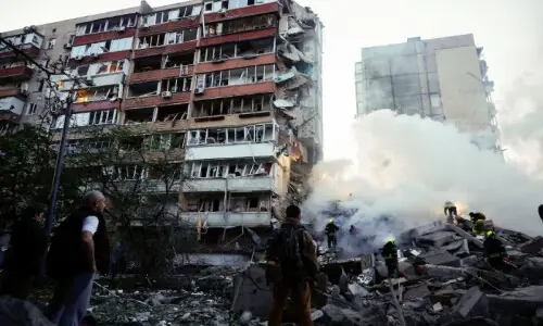 Russia pummels Kyiv, killing at least 10 and denting peace hopes