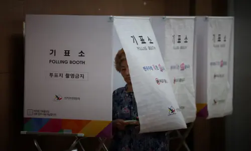 South Koreans vote in local elections seen as gauge of President Lee's first year