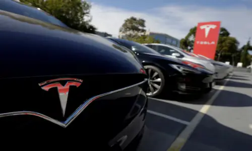 JP Morgan upgrades Tesla to 'neutral', sees robotics driving long-term growth